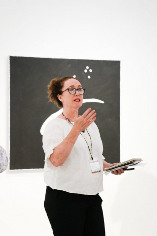 BRAG Director Sarah Gurich speaks to Education Symposium attendees