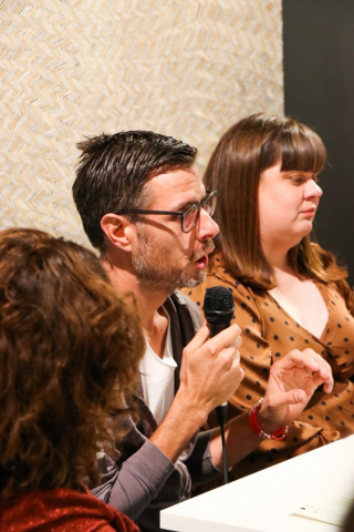 Jonathan Jones speaks on the panel talk