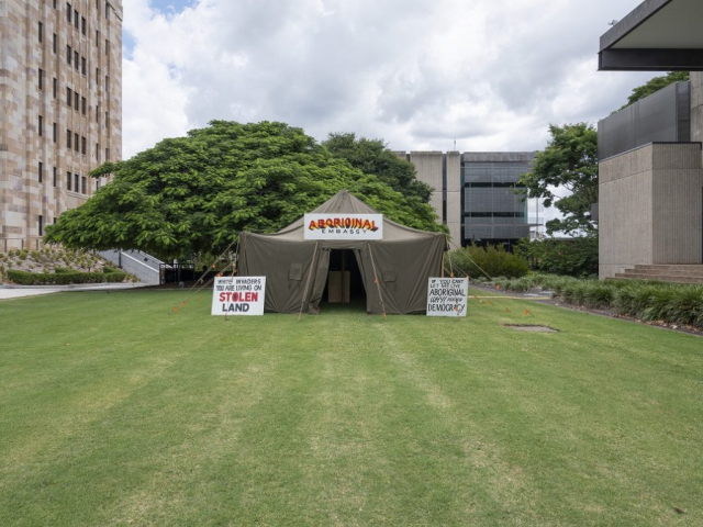 Richard Bell, Embassy, 2013–2020. Installation view, OCCURRENT AFFAIR, UQ Art Museum, 2021. Reproduced courtesy of the artist and Milani Gallery, Brisbane. Photo: Carl Warne