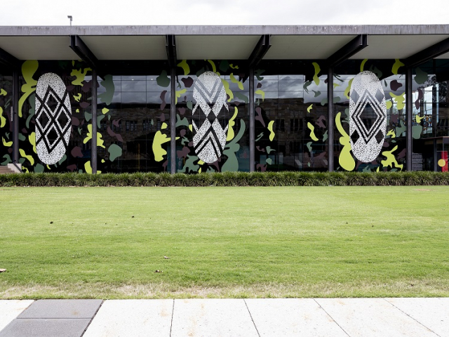 Jennifer Herd In defence, 2021 vinyl lettering UQ Art Museum Window Commission. Installation view, OCCURRENT AFFAIR, UQ Art Museum, 2021. Courtesy of the artist and FireWorks Gallery, Brisbane. Photo: Carl Warner