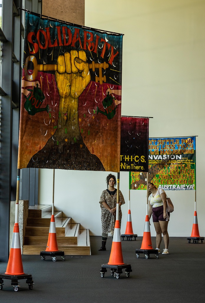 Gordon Hookey. Installation view, OCCURRENT AFFAIR, UQ Art Museum, 2021. Reproduced courtesy of the artists and Milani Gallery, Brisbane. Photo: Carl Warner.