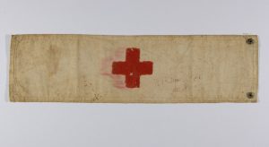 Armband, or brassard, belonging to Private Norman Victor Reid who served at the No. 2 Australian General Hospital at Gezira, Cairo, during WWI. Image and information courtesy of Port Macquarie Museum, 2023.